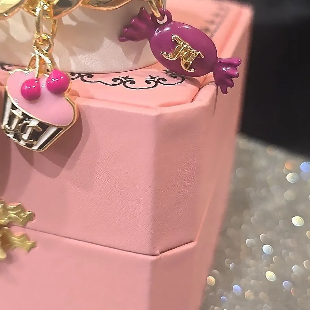 Juicy Couture Gold‎ Charm Bracelet Watch
